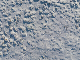 Photo texture of a snow field, copy space.  Drone photo.
