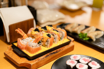 Salmon Sushi with Cheese Sauce