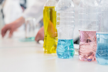 chemical experiments, reagents, various liquids in large bottles. High quality photo