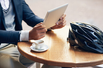 Businessman, hands and outdoor at cafe with tablet for reading news, article or travel research....