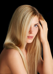 Naklejka premium Beauty, hair and portrait of woman with straight hairstyle, salon care and keratin isolated in dark studio. Styling, treatment and face of blonde girl with healthy haircare shine on black background.