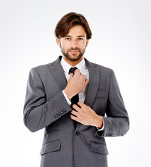 Businessman, portrait and fashion with tie for career ambition or opportunity on a white studio...