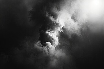 Dramatic and moody depiction of swirling fog storm clouds and rain mist against dark black background capturing intense and powerful essence of stormy weather