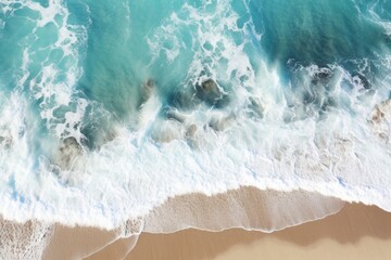 Fototapeta na wymiar A stunning aerial view of the ocean and the beach. This image captures the beauty and tranquility of the coastline. Perfect for travel brochures, website backgrounds, and vacation-themed designs