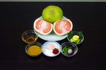 Grapefruit salad is made with grapefruit, mustard oil, kasundi, salt, best salt, pepper, guava