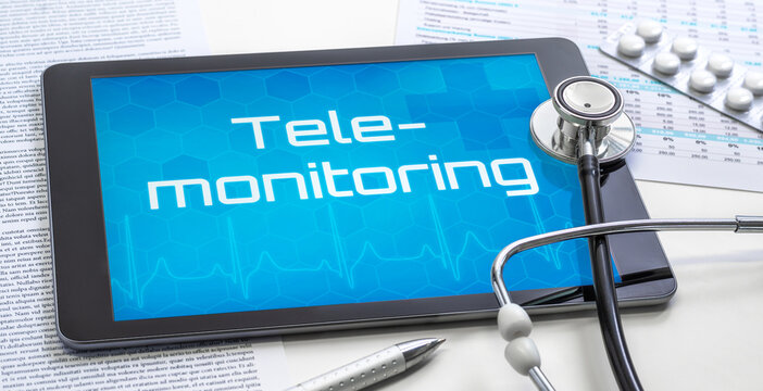 A tablet with the word Telemonitoring on the display