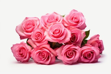 A bunch of pink roses on a white surface. Perfect for floral arrangements or as a decorative element