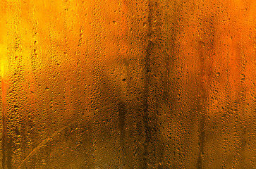 wet glass background. drops on the glass.