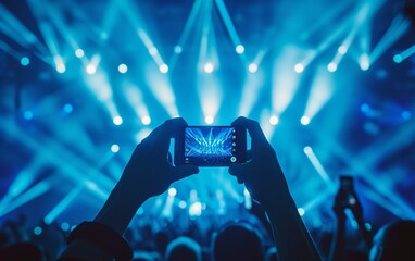 Person Capturing Concert Moment With Cell Phone