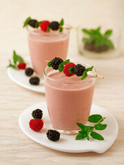 Yogurt with blackberries and raspberries.
