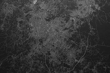 Street map of Amman (Jordan) on black paper with light coming from top