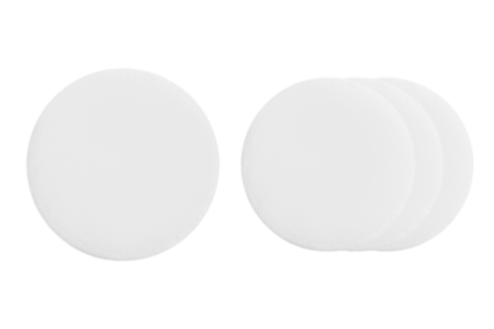 Cotton round cosmetic sponges on a blank background