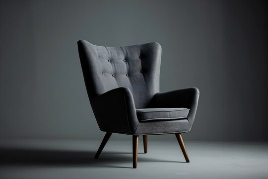 Grey armchair on grey minimalist room