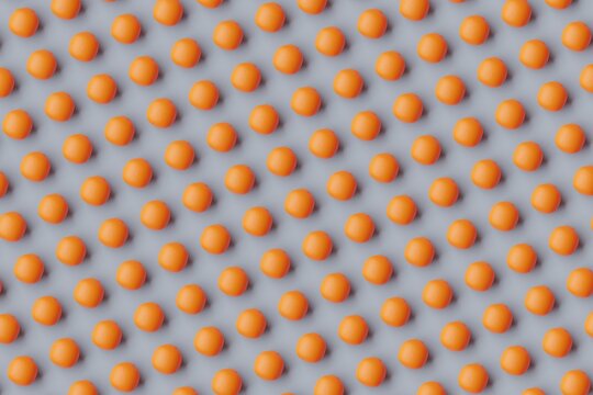 Many oranges on slate gray background. Top flat view, symmetrical grid. 3d render, illustration