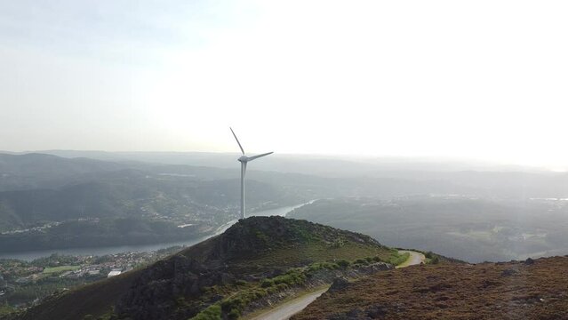 Drone footage of a wind turbine in the middle of Serra da Freita Arouca Geopark in Portugal