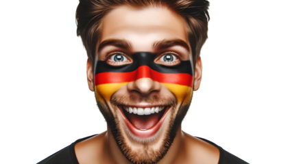 man soccer fun portrait with painted face of german national flag isolated on transparent background