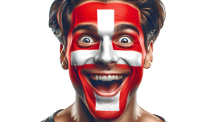 man soccer fun portrait with painted face of swiss national flag isolated on transparent background