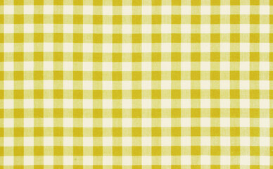 Yellow checkered textile background,picnic cloth texture.Food advertisement background.