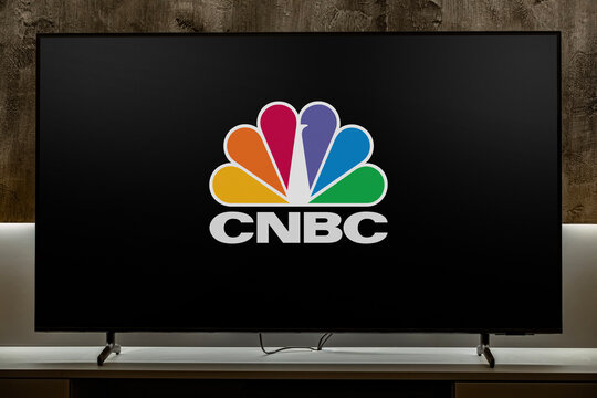 Flat-screen TV set displaying logo of CNBC