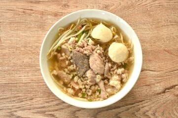 boiled slice soft and chop pork and meatball in clear soup on bowl 