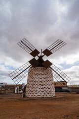 Traditional Windmill Under Cloudy Sky in Valles de Ortega, Fuerteventura
