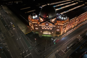 flinders street railway station grand entrance at night, decretive Victorian style architecture ,...