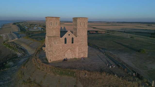 Rotating drone of the landmark of Reculver Towers and Roman Fort in Herne Bay Town, England