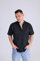 In this captivating minimalist portrait, a man emanates strength and quiet confidence. 