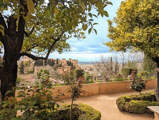Fototapeta na wymiar Picturesque view of the tranquil Alhambra gardens in sunny Spain
