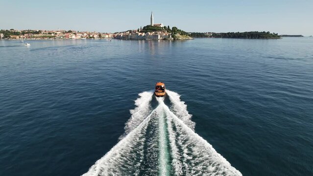 Aerial view of a boat driving near the coast of Rovinj
City in Croatia