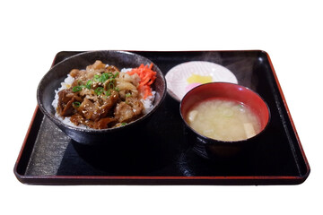 The pork rice bowl set includes soup.