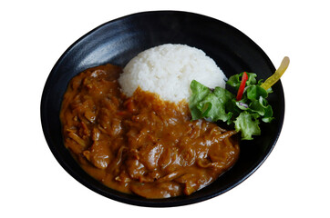 Curry rice topped with rice in a plate.
