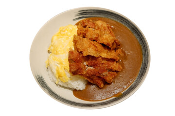 Curry rice topped with rice in a plate.