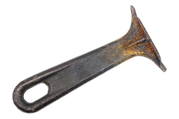 Old grungy black cast iron skillet handle