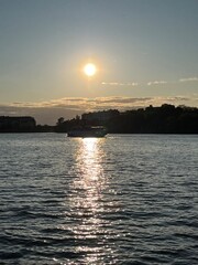 Naklejka premium sunset over the river