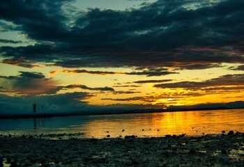 Spectacular sunset over Lake Neusiedl in Podersdorf, Austria creating a fairytale-like atmosphere