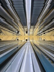 Overhead view of modern escalators traveling up and down