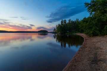 Tranquil scene of a beach at dusk.