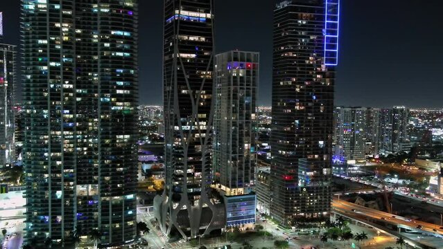 Aerial view of illuminating Skyscrapers of Downtown Miami in Florida at night