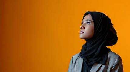 Portrait of a young muslim woman isolated and showing blank area, realistic, HD, copy space - generative ai