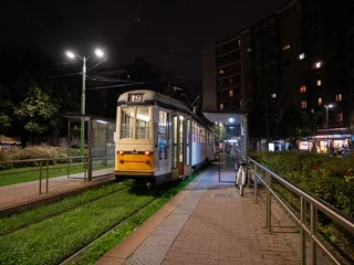 Fototapete Rund Tram in the city Milano by night © Marco