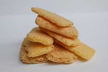 Rice crackers with powder flavoring, isolated on white background