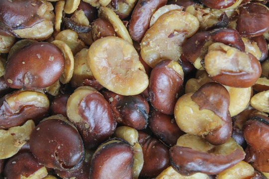 Kacang koro, or jack bean. Cooked and served with salt. Indonesian snack