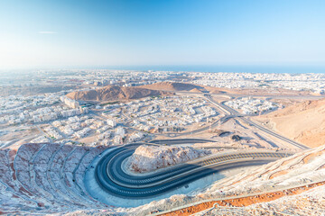 View from the top on wavy road in Muscat in day time