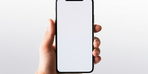 A man holds a smartphone with a white screen in his hand