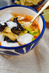 メキシコのスープ　ソパ・デ・トルティージャ（ソパ・アステカ）コピースペースあり
 Mexican soup　Sopa de Tortilla (Sopa Azteca）with copy space
