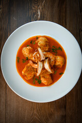 Recipe for Armorican-style monkfish tail, prawns, flambees with cognac, High quality photo