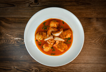 Recipe for Armorican-style monkfish tail, prawns, flambees with cognac, High quality photo
