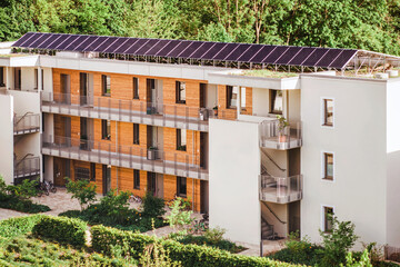 Solar Panels Roof. Solar Panel Station Energy System on Roof Building. Modern High-rise Multifamily...