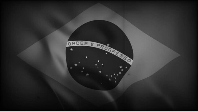Black and White flag of Brazil with old Retro film style overlay | Brazil's flag in black and white waving smoothly with retro grains effect 